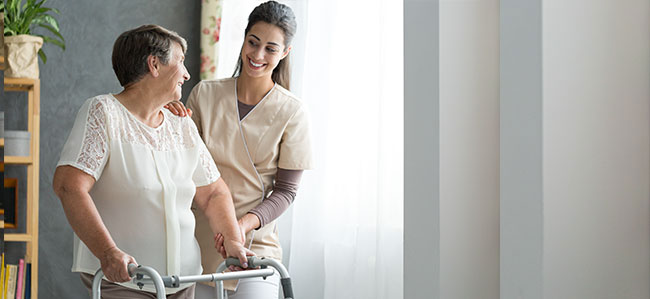 nurse helping the elderly
